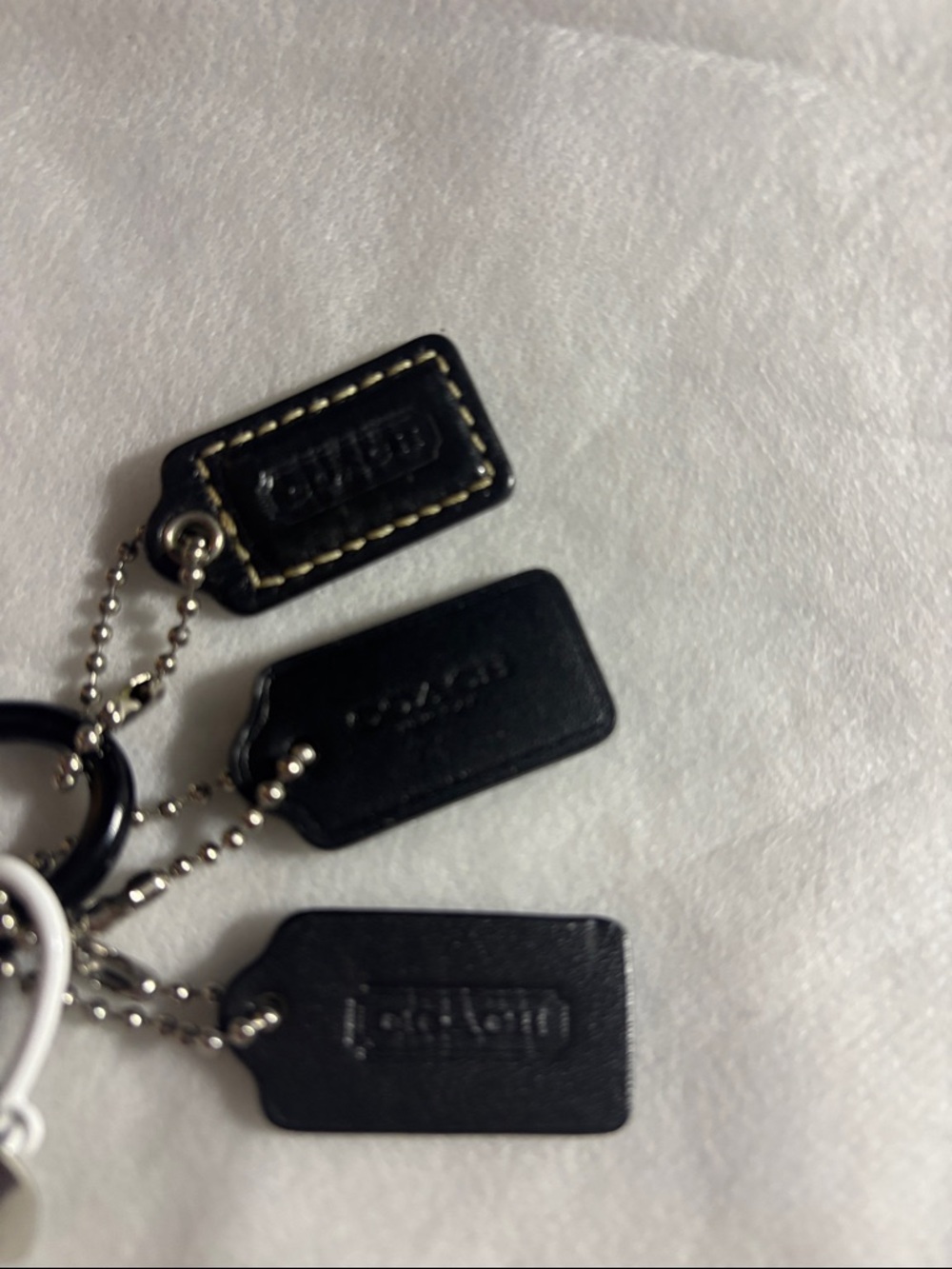 Coach mini tags (3) and (3) other key chains - Picture 3 of 14